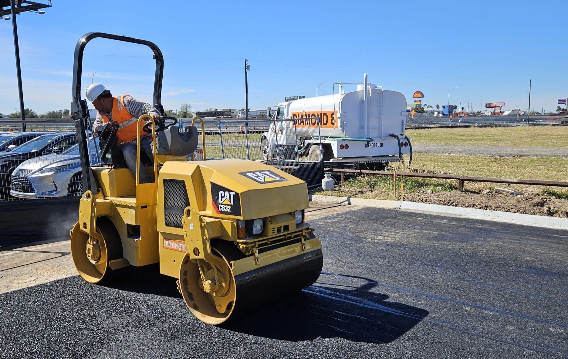 Diamond Eight CAT CB32 roller — commercial asphalt paving